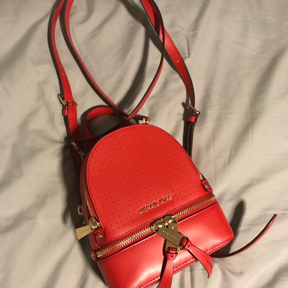 rhea mini perforated leather backpack